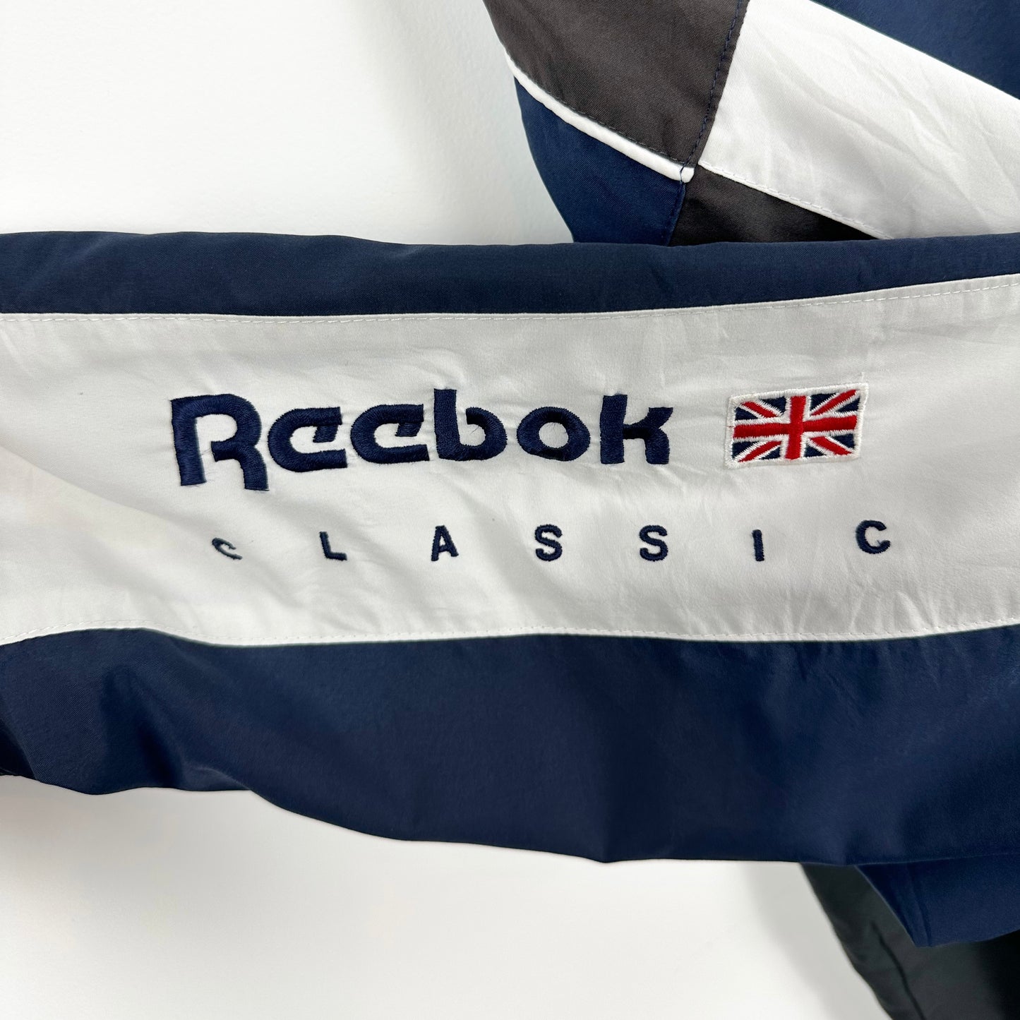 Vintage 90's Reebok Navy/Brown Track Jacket